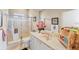 Bathroom featuring a walk-in shower, sink with vanity, and bright natural light at 1210 Eagles Flight Way, North Port, FL 34287