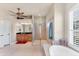 Bathroom featuring a walk-in shower, a separate tub, and wood cabinets at 1210 Eagles Flight Way, North Port, FL 34287