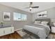 Inviting bedroom with wood floors, soft natural light and stylish decor at 12590 Ghiberti Cir # 201, Venice, FL 34293