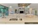 Modern kitchen island overlooking the living area, enhancing the home's open-concept design at 12590 Ghiberti Cir # 201, Venice, FL 34293