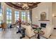 Bright community lounge with comfortable seating, fireplace, and lovely views at 12590 Ghiberti Cir # 201, Venice, FL 34293