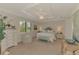 Spacious main bedroom features tray ceiling, plantation shutters, and an elegant upholstered headboard with bench at 12590 Ghiberti Cir # 201, Venice, FL 34293