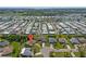 Overhead perspective of a residential home within a planned community offering a range of housing options and green spaces at 1315 Pine Needle Rd, Venice, FL 34285