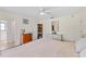 Bedroom showcasing hardwood floors and a view to the other rooms at 1315 Pine Needle Rd, Venice, FL 34285