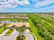 Beautiful aerial view of home, landscaping and community with waterway at 13913 Alafaya St, Venice, FL 34293