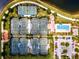 Overhead view showcases community tennis courts, a lap pool, and parking at 13913 Alafaya St, Venice, FL 34293