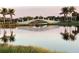 Scenic view of a pedestrian bridge over a tranquil lake, reflecting the pastel sky at 13913 Alafaya St, Venice, FL 34293