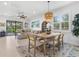 Open living space with sliding glass doors to the lanai and comfortable seating at 13913 Alafaya St, Venice, FL 34293