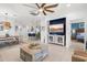 Open concept living space features tile floors, a casual dining area and a kitchen with a breakfast bar at 13913 Alafaya St, Venice, FL 34293