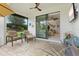 Lovely outdoor patio with seating area leading into the main house at 13913 Alafaya St, Venice, FL 34293
