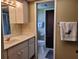 Clean bathroom with updated cabinets and fixtures at 1608 E Cypress Point Dr, Venice, FL 34293