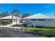 Well maintained community center features clean landscaping and fresh paint at 1614 Quail Lake Dr, Venice, FL 34293