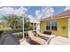 Relaxing screened lanai with lounge chairs and a grill for outdoor entertainment at 1620 San Silvestro Dr, Venice, FL 34285