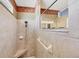 Beautiful bathroom with a glass-enclosed shower featuring a corner seat at 1620 San Silvestro Dr, Venice, FL 34285
