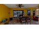 Cozy outdoor dining area on a screened lanai for relaxing and entertaining at 1620 San Silvestro Dr, Venice, FL 34285