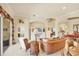 Bright and airy living room with comfortable seating and elegant architectural details at 1620 San Silvestro Dr, Venice, FL 34285