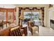 Living space with seamless access to the screened lanai, pool, and lake at 1620 San Silvestro Dr, Venice, FL 34285