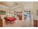Open floorplan seamlessly connecting dining, kitchen, and living room perfect for entertaining at 1620 San Silvestro Dr, Venice, FL 34285