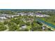 Aerial view of the neighborhood with a pond at 2185 Park Rd, Venice, FL 34293