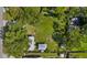Overhead view of the property showing the home and outbuildings at 2185 Park Rd, Venice, FL 34293