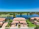 This home sits overlooking a serene lake and lush golf course at 23527 Awabuki # 202, Venice, FL 34293