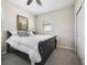 Inviting bedroom featuring a comfortable bed and neutral décor, perfect for relaxation at 23527 Awabuki # 202, Venice, FL 34293