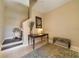 Inviting entryway with a staircase lift, stylish console table, bench seating, and neutral decor at 23527 Awabuki # 202, Venice, FL 34293
