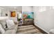 Comfortable living room showcasing stylish furnishings and a modern entertainment center at 23527 Awabuki # 202, Venice, FL 34293