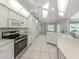 Bright kitchen with white appliances, plenty of cabinet space, and natural light at 24339 Matias Ln, Punta Gorda, FL 33955