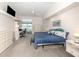 Bright, spacious main bedroom featuring a king bed, high ceilings, and access to the lanai at 24339 Matias Ln, Punta Gorda, FL 33955