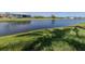 Scenic view of backyard pond at 24339 Matias Ln, Punta Gorda, FL 33955