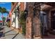 Downtown storefront with decorative columns, green foliage, and street access at 24339 Matias Ln, Punta Gorda, FL 33955