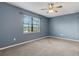 Cozy bedroom with a window offering serene views at 2487 Marton Oak Blvd, North Port, FL 34289