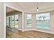 Bright dining area overlooking the pool and patio through sliding glass doors at 26115 Rampart Blvd, Punta Gorda, FL 33983