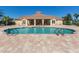 Resort-style pool and lounging deck offer relaxing waterside experience at 2928 Seasons Blvd, Sarasota, FL 34240