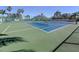 The community tennis court is well-lit, fenced, and provides a great space for recreational activities at 2928 Seasons Blvd, Sarasota, FL 34240