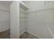 Spacious walk-in closet featuring wire shelving for optimal organization and storage solutions at 2928 Seasons Blvd, Sarasota, FL 34240