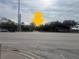 Street view of a modest single-story home with stone facade, across the road at 3010 17Th St, Sarasota, FL 34234