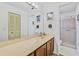 Bathroom offers a single sink vanity, ample counter space, and walk-in shower at 330 Mission N Trl # B, Venice, FL 34285