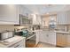 Well-equipped kitchen with stainless appliances, and lots of storage, perfect for cooking at 330 Mission N Trl # F, Venice, FL 34285