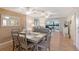 Open concept living space combining dining and living areas, ideal for entertaining at 330 Mission N Trl # F, Venice, FL 34285