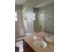 This is a bathroom with a single sink vanity and tub shower combination at 3601 Point St, North Port, FL 34286
