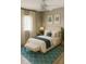 Comfortable bedroom with neutral tones, plush bedding, and plenty of natural light at 3601 Point St, North Port, FL 34286