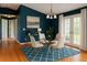 Cozy dining area featuring a glass table, modern chairs, and ample natural light at 3601 Point St, North Port, FL 34286