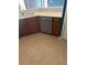 Well-equipped kitchen with modern dishwasher and sleek countertops at 3601 Point St, North Port, FL 34286
