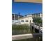 Waterfront Clubhouse with a bridge entryway and swimming pool at 3697 Lake Bayshore Dr # H-109, Bradenton, FL 34205