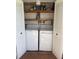 Laundry closet featuring a washing machine and dryer at 3697 Lake Bayshore Dr # H-109, Bradenton, FL 34205