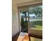 Inviting patio entry with tranquil lake views and relaxing scenery at 3697 Lake Bayshore Dr # H-109, Bradenton, FL 34205