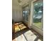 Bright sunroom with a view of the pond at 3697 Lake Bayshore Dr # H-109, Bradenton, FL 34205