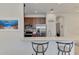 Kitchen boasting stainless steel appliances and a breakfast bar with stool seating at 371 Capulet Dr, Venice, FL 34292